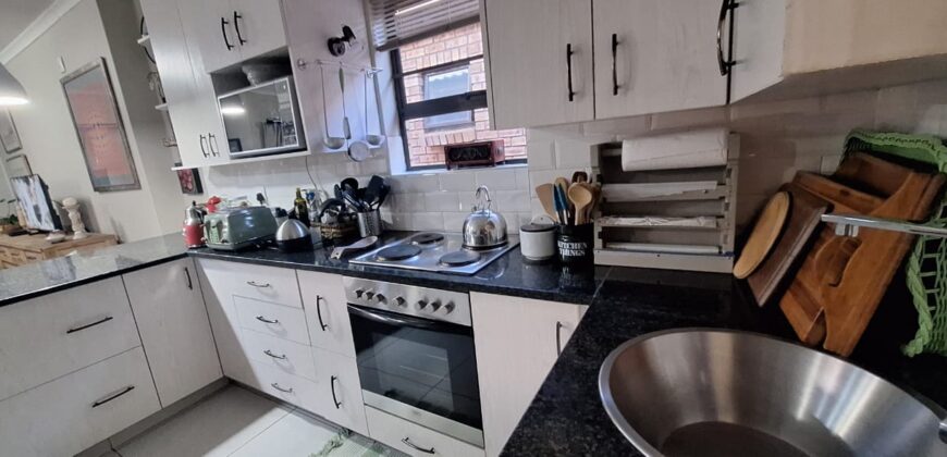 EXCEPTIONALLY NEAT 3-BEDROOM TOWNHOUSE IN A QUIET, SOUGHT-AFTER NEIGHBOURHOOD