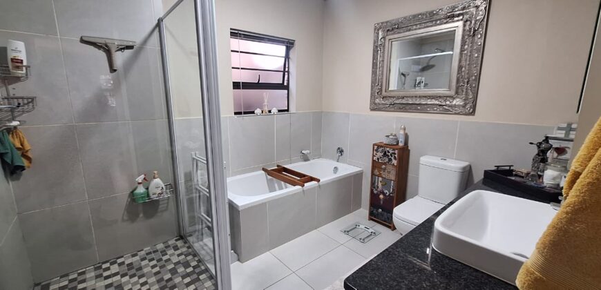 EXCEPTIONALLY NEAT 3-BEDROOM TOWNHOUSE IN A QUIET, SOUGHT-AFTER NEIGHBOURHOOD